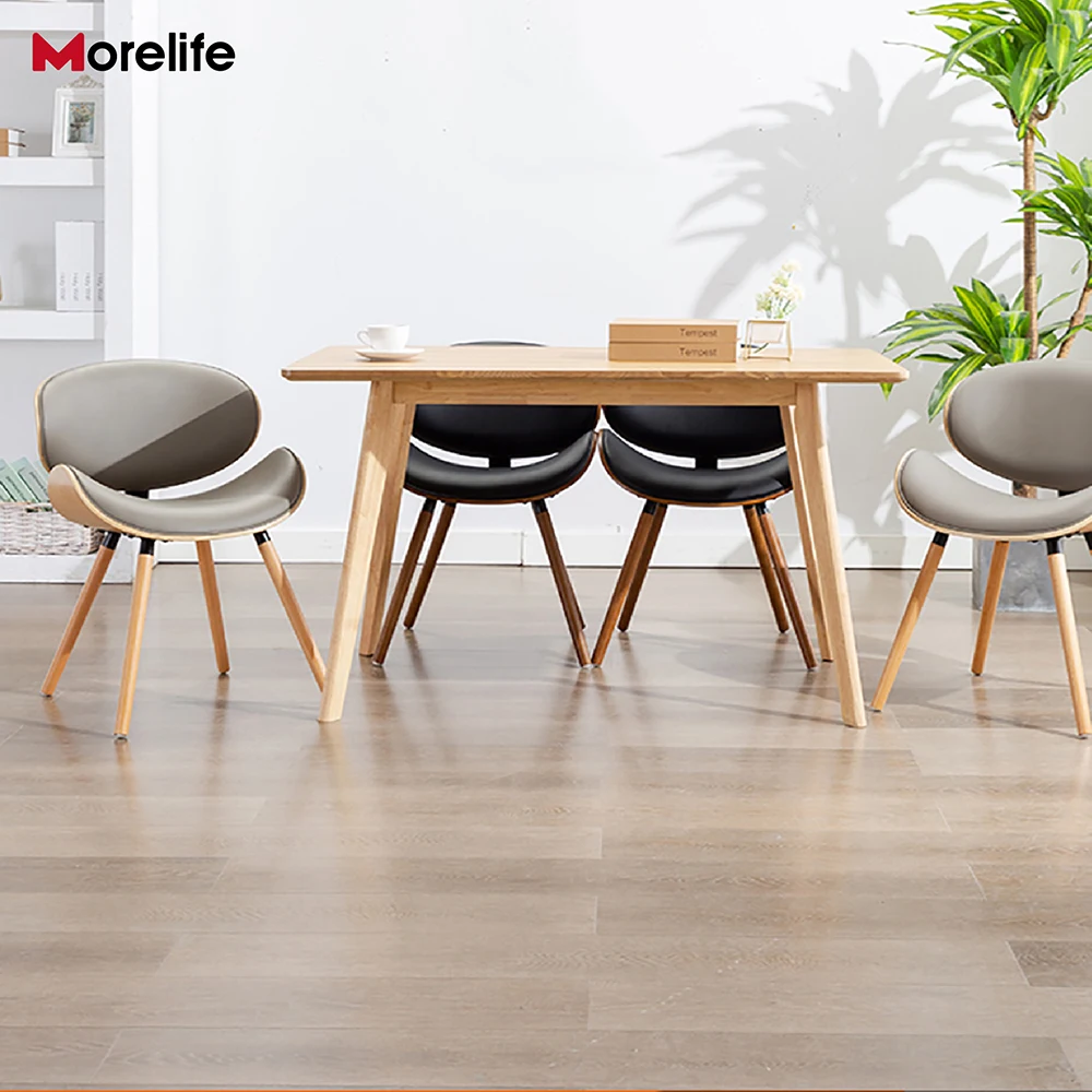 Европейският модерен прост луксозен стол с облегалка, малко семейство във формата на бръмбар, компактен практичен кът за стол от масивна дървесина и кожа 3